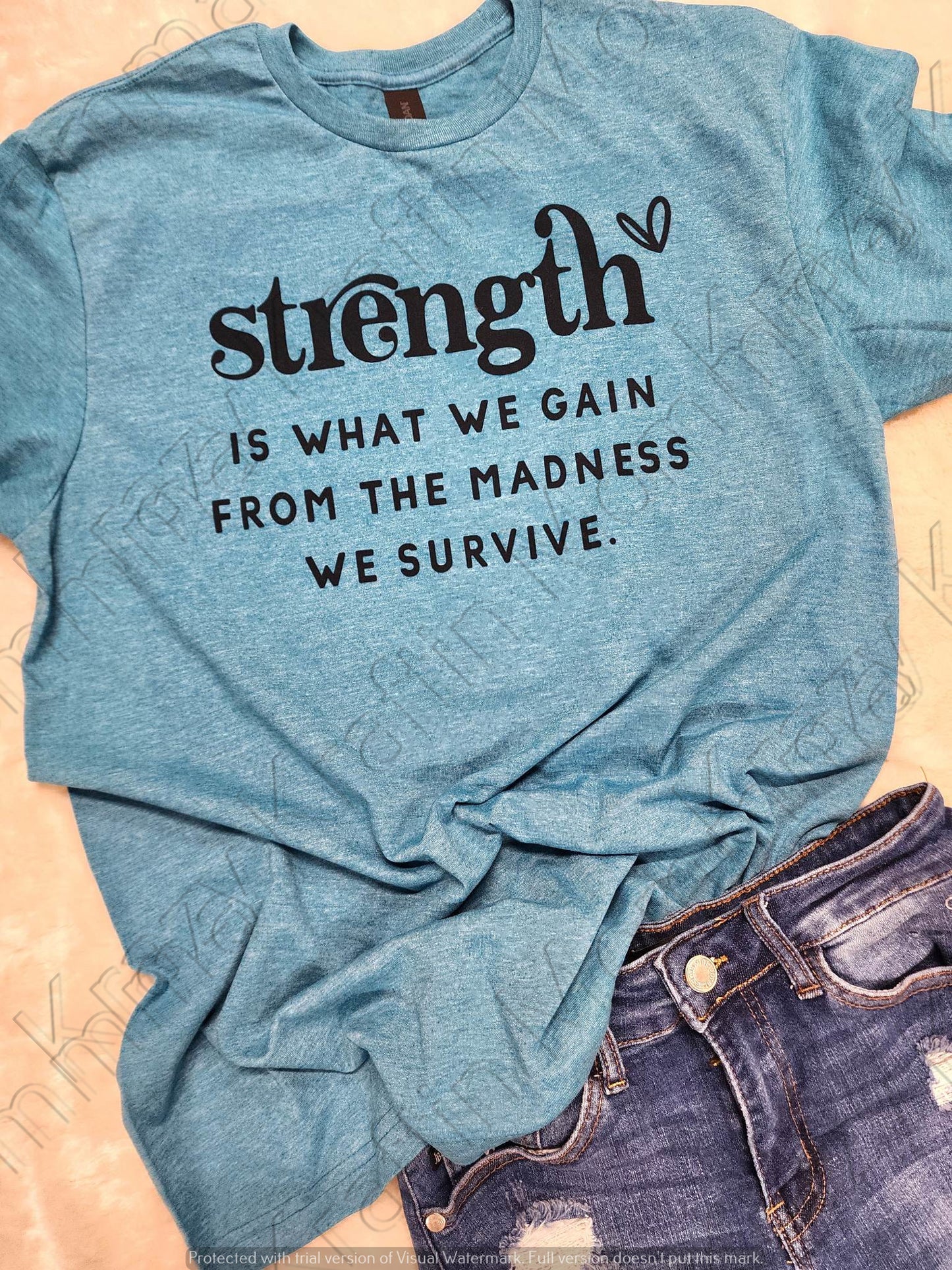 Strength is what we gain Tee